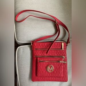 Elegant Red Crossbody Bag with Gold Accents